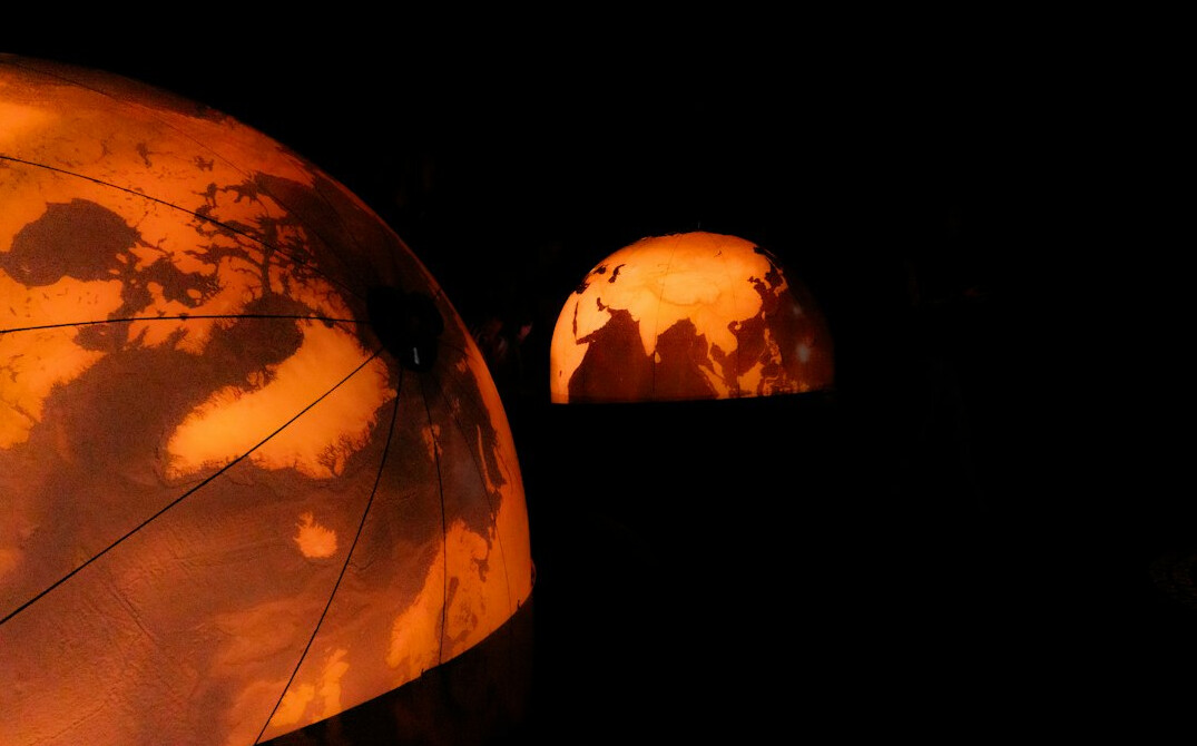 Glowing global network connections across the earth at night