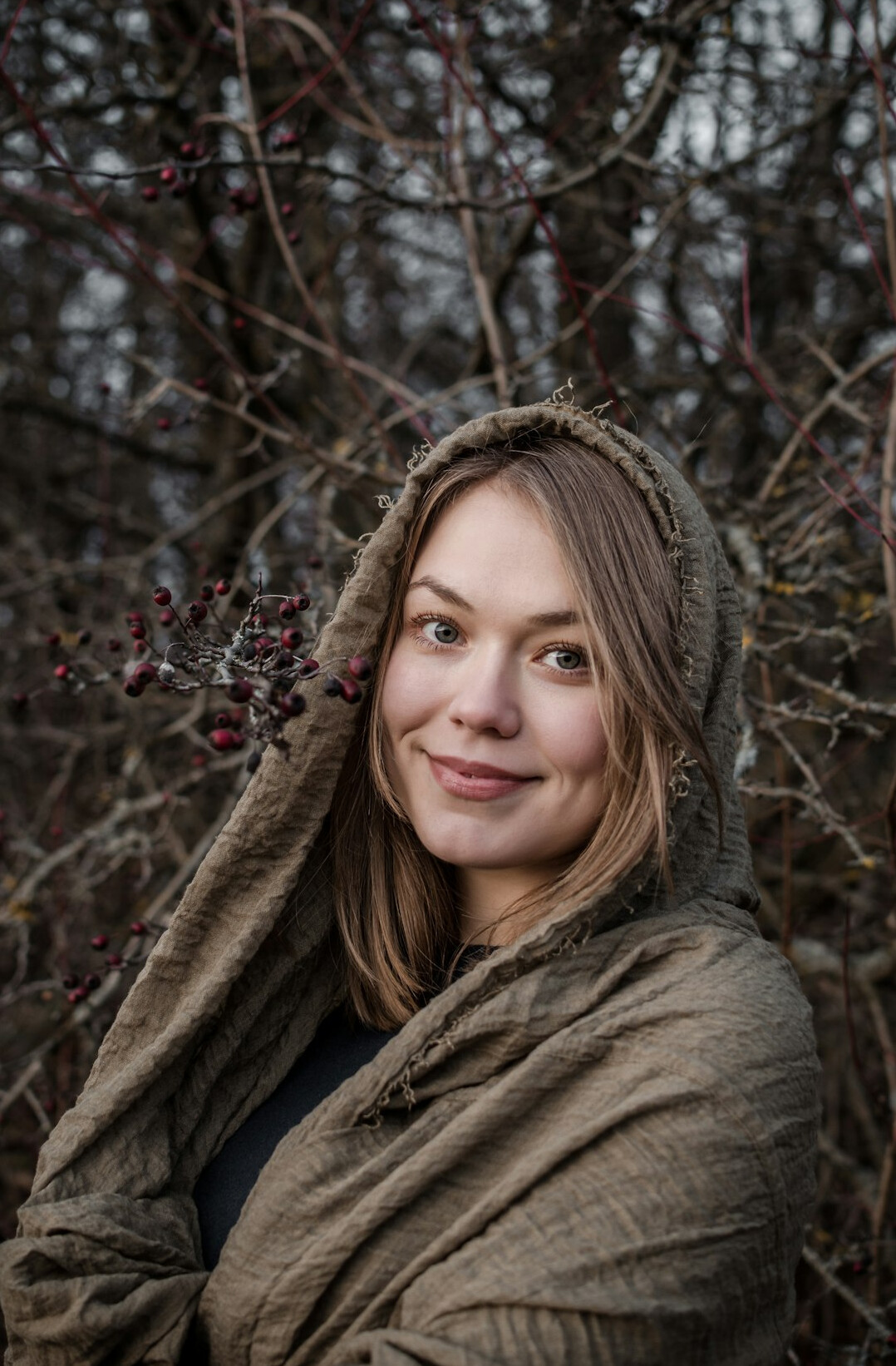 Portrait of a young woman with a warm smile